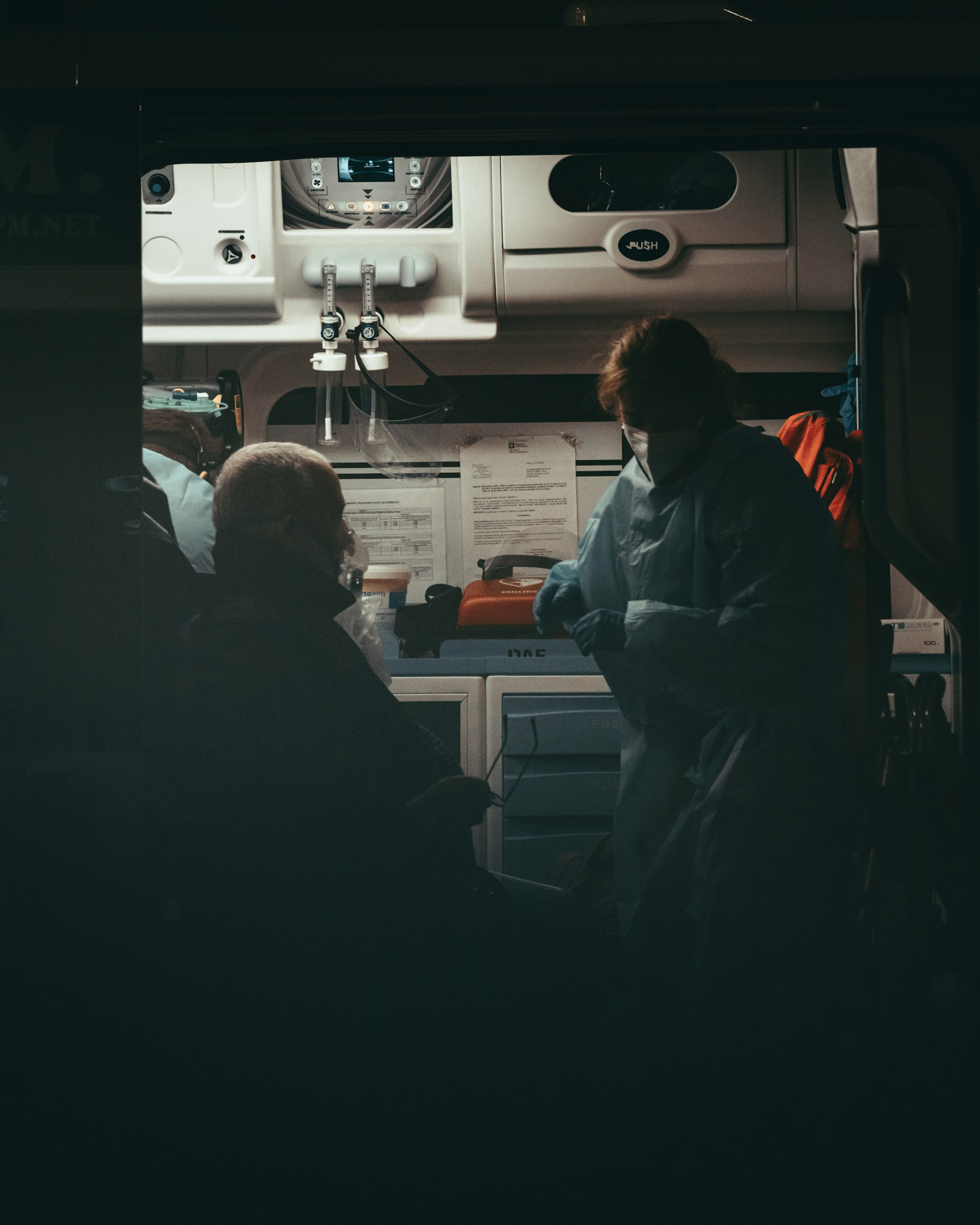 First responders inside an ambulance